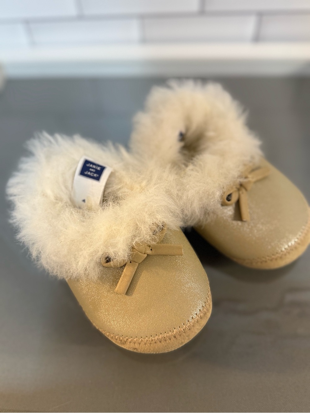 Janie and Jack Cream Faux-Fur Trim Slip-On Moccasin Slippers